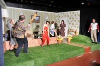 The 'children' playing cricket